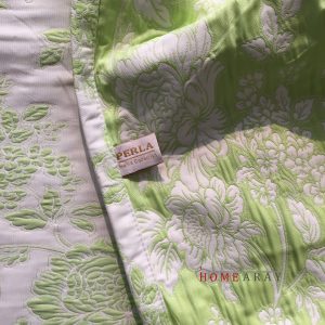 both sides of green jaquard coverlet code 026